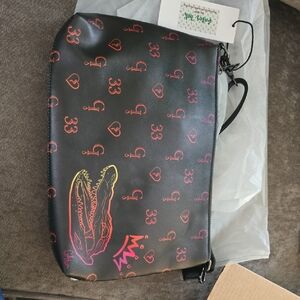 Chic Black Shoulder Bag with Vibrant Accents